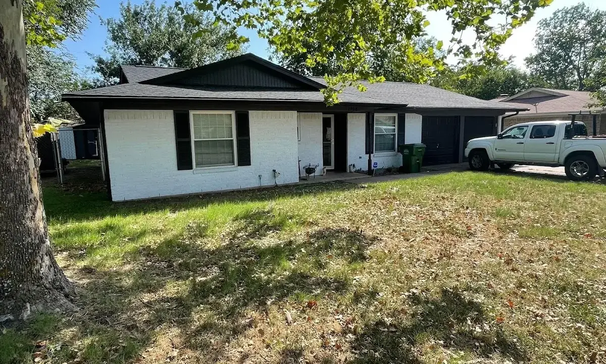 Professional roofing crew working on a residential roof in Kingsport